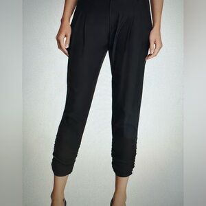 Parker Devlin black silk pants. Loose fit and hit if-calf. Like new!